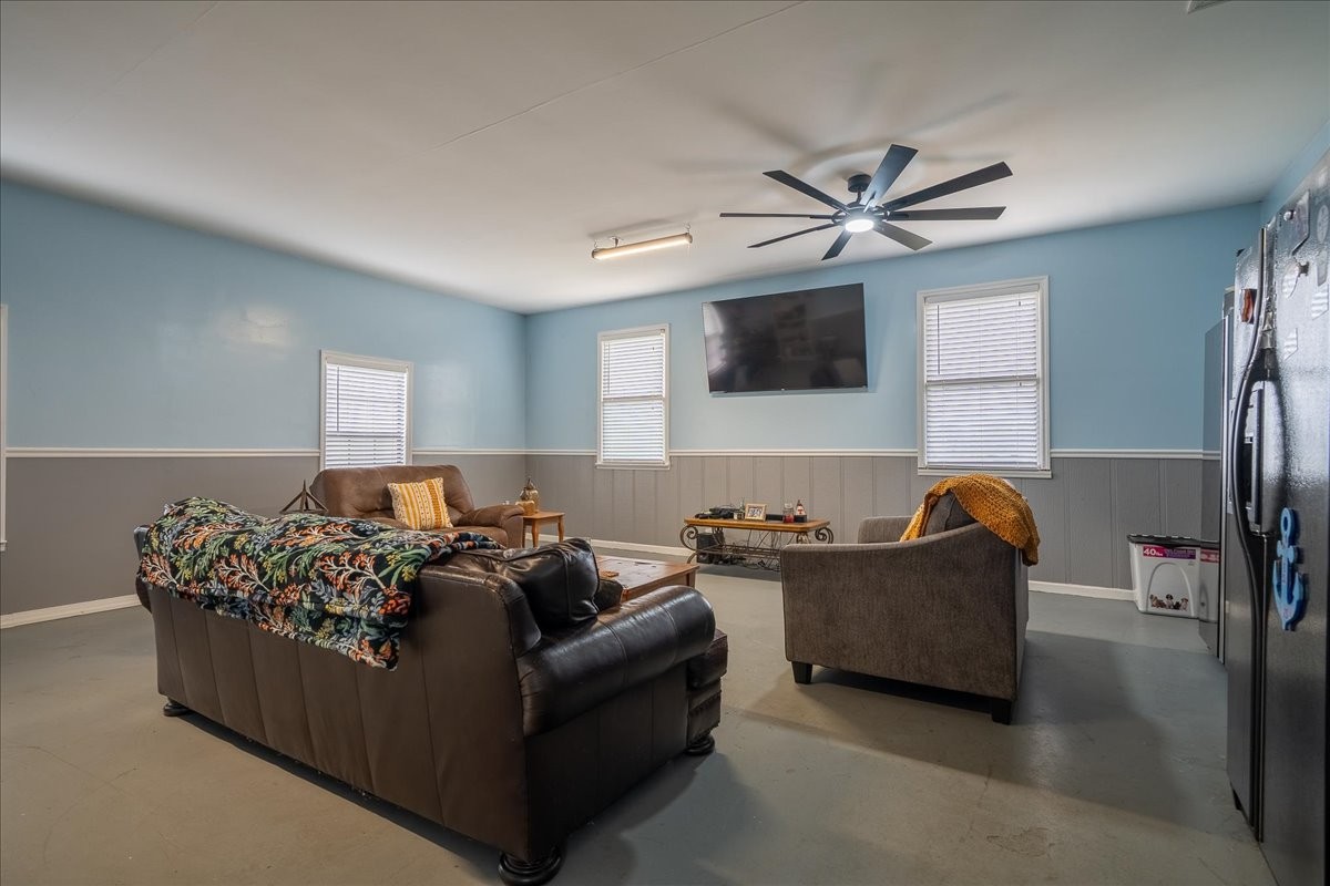 79 French Road Loretto, TN 38469 - Photo 32 of 52 a living room with furniture and a flat screen tv