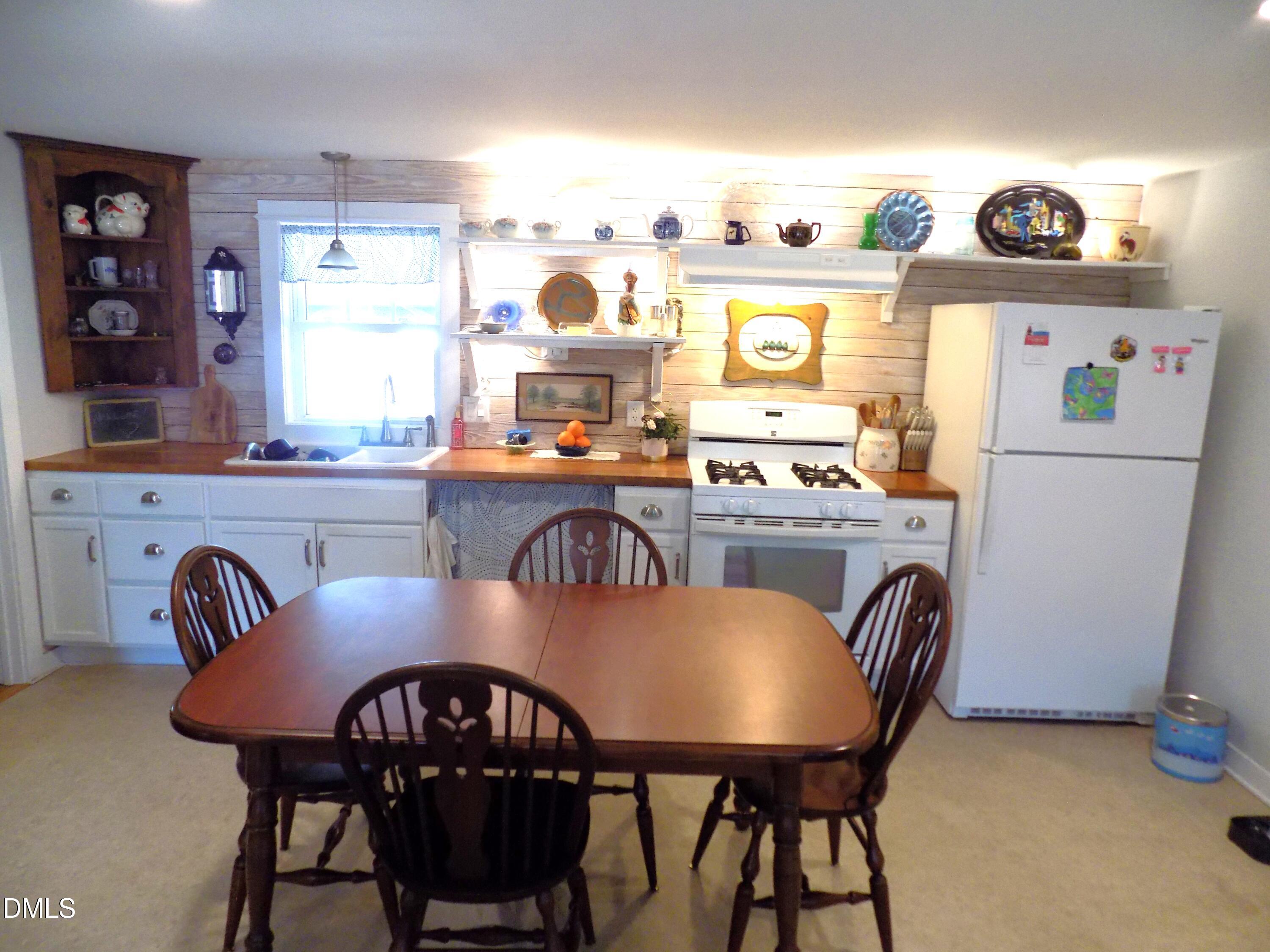 15 Full Circle Spring Hope, NC 27882 - Photo 12 of 51 a view of a dining room with furniture