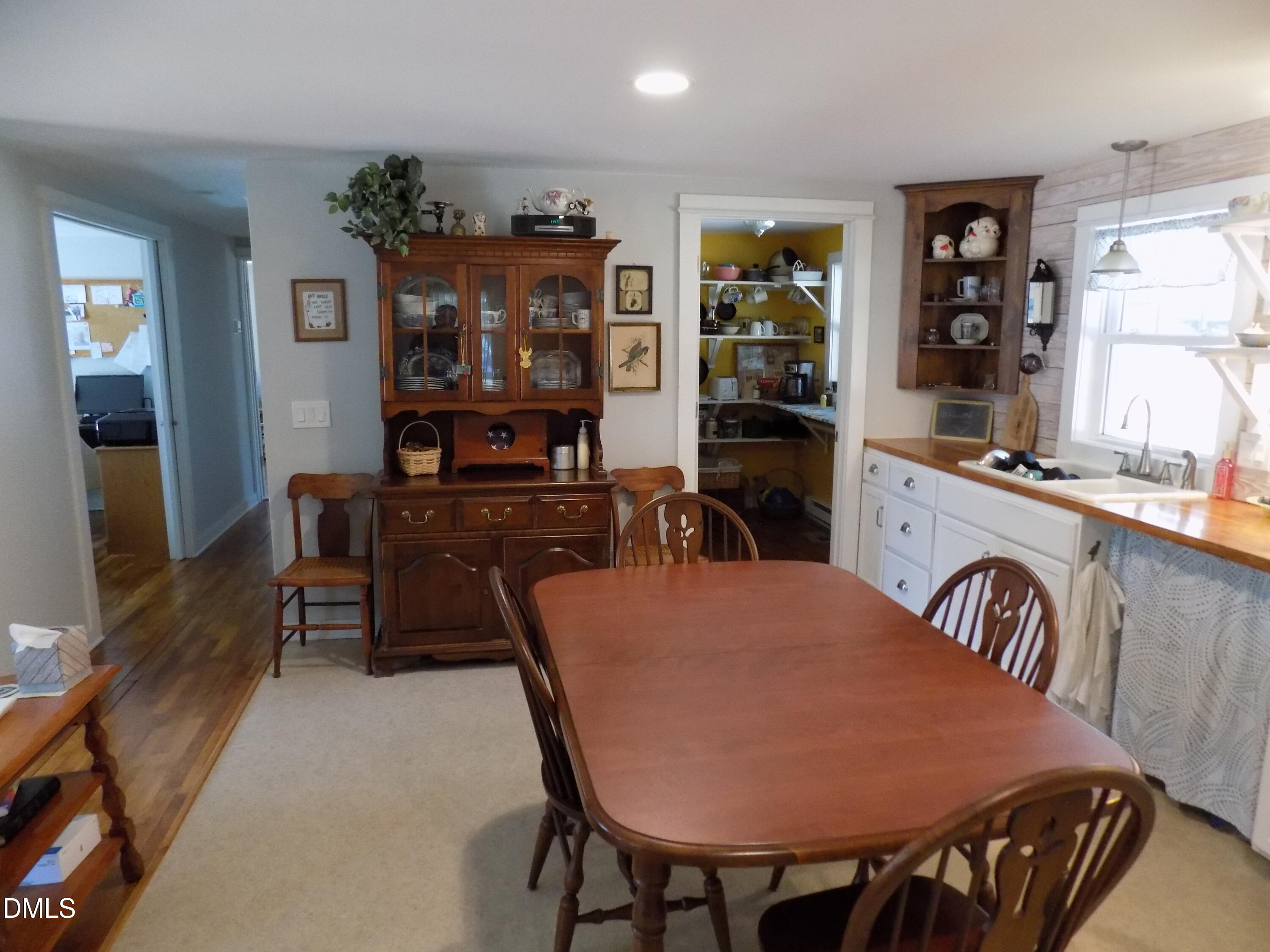 15 Full Circle Spring Hope, NC 27882 - Photo 13 of 51 a view of a dining room with furniture