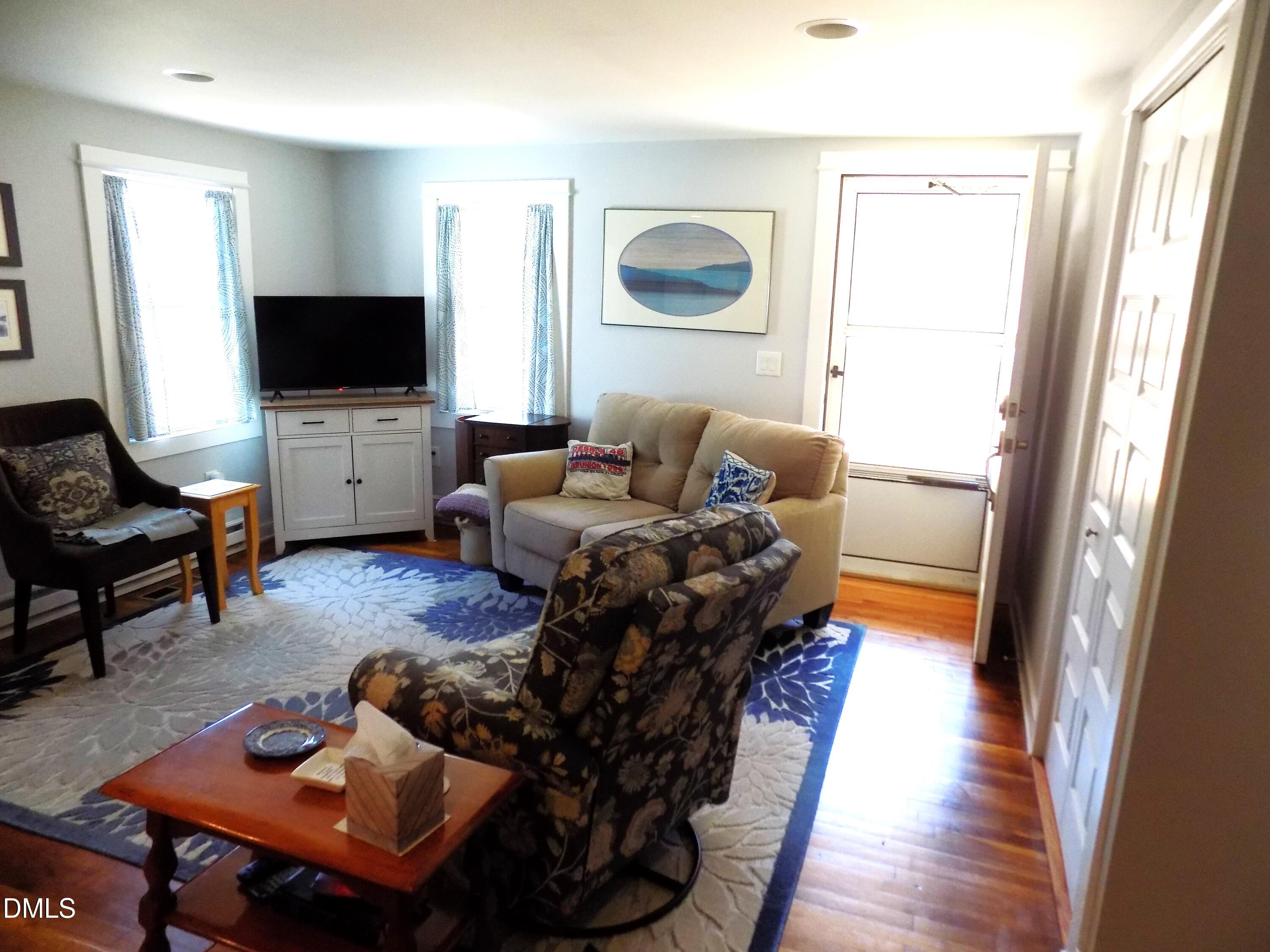 15 Full Circle Spring Hope, NC 27882 - Photo 14 of 51 a living room with furniture and a flat screen tv