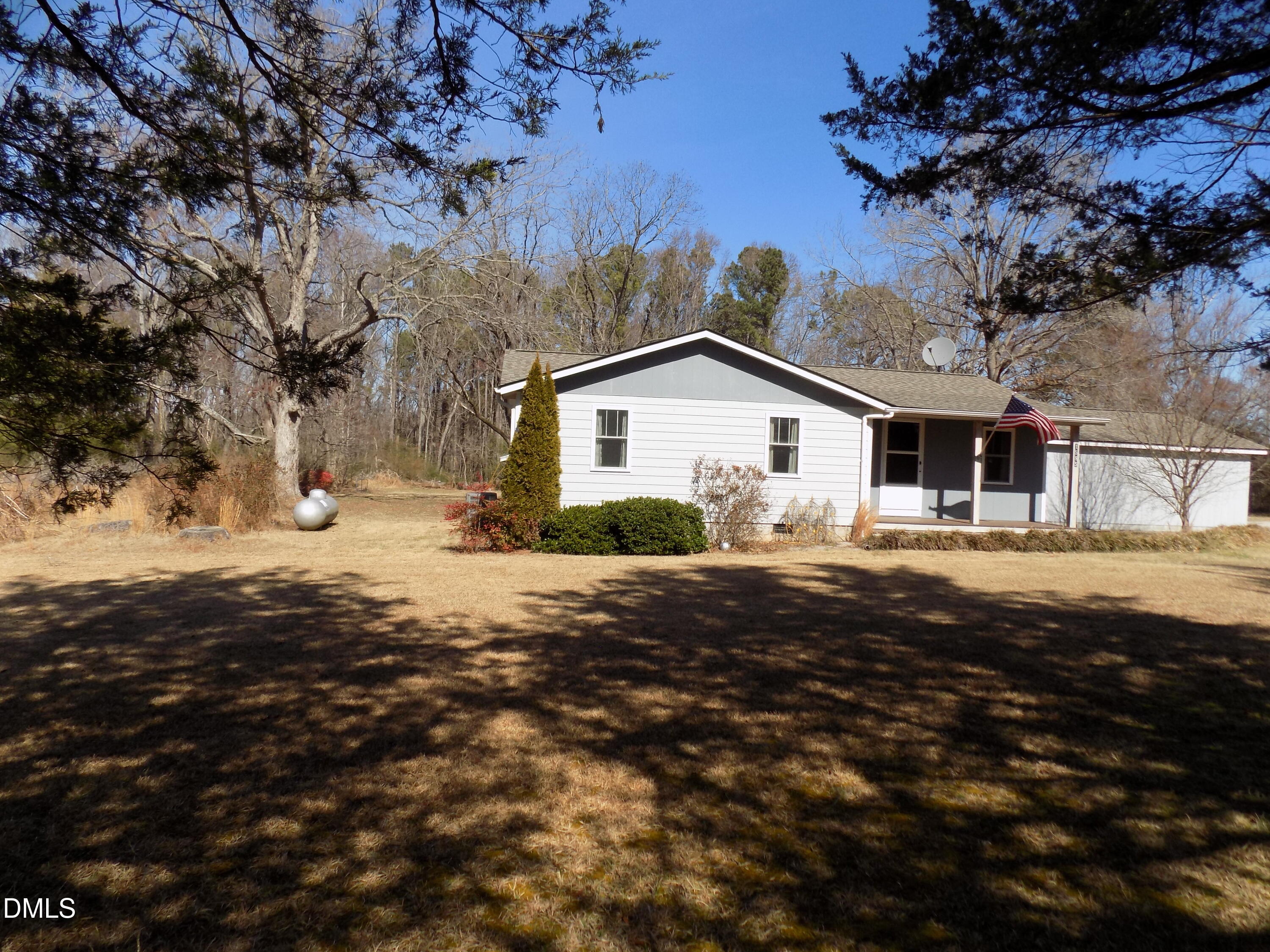 15 Full Circle Spring Hope, NC 27882 - Photo 2 of 51 a front view of a house with a yard
