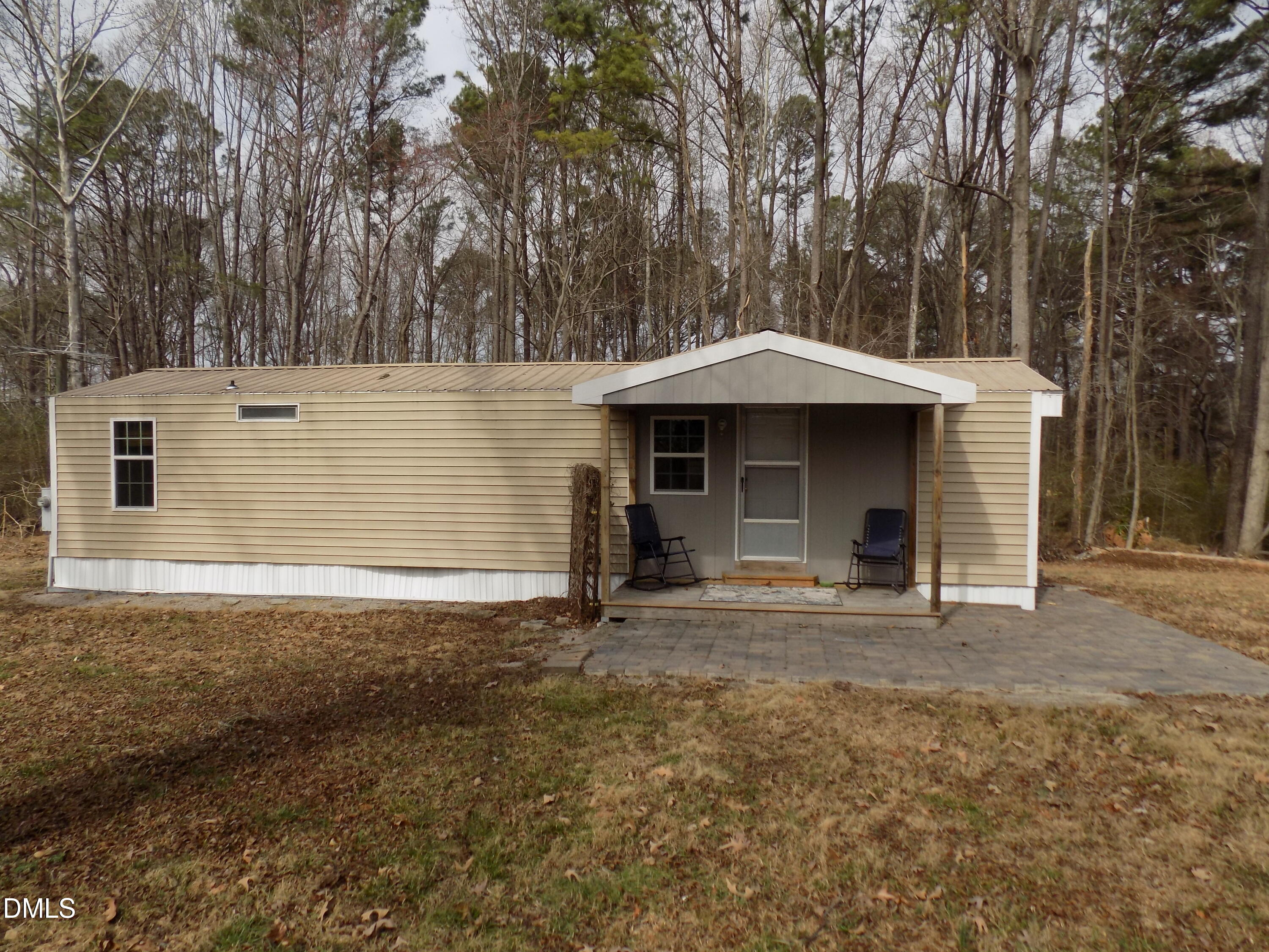 15 Full Circle Spring Hope, NC 27882 - Photo 28 of 51 a front view of a house with yard