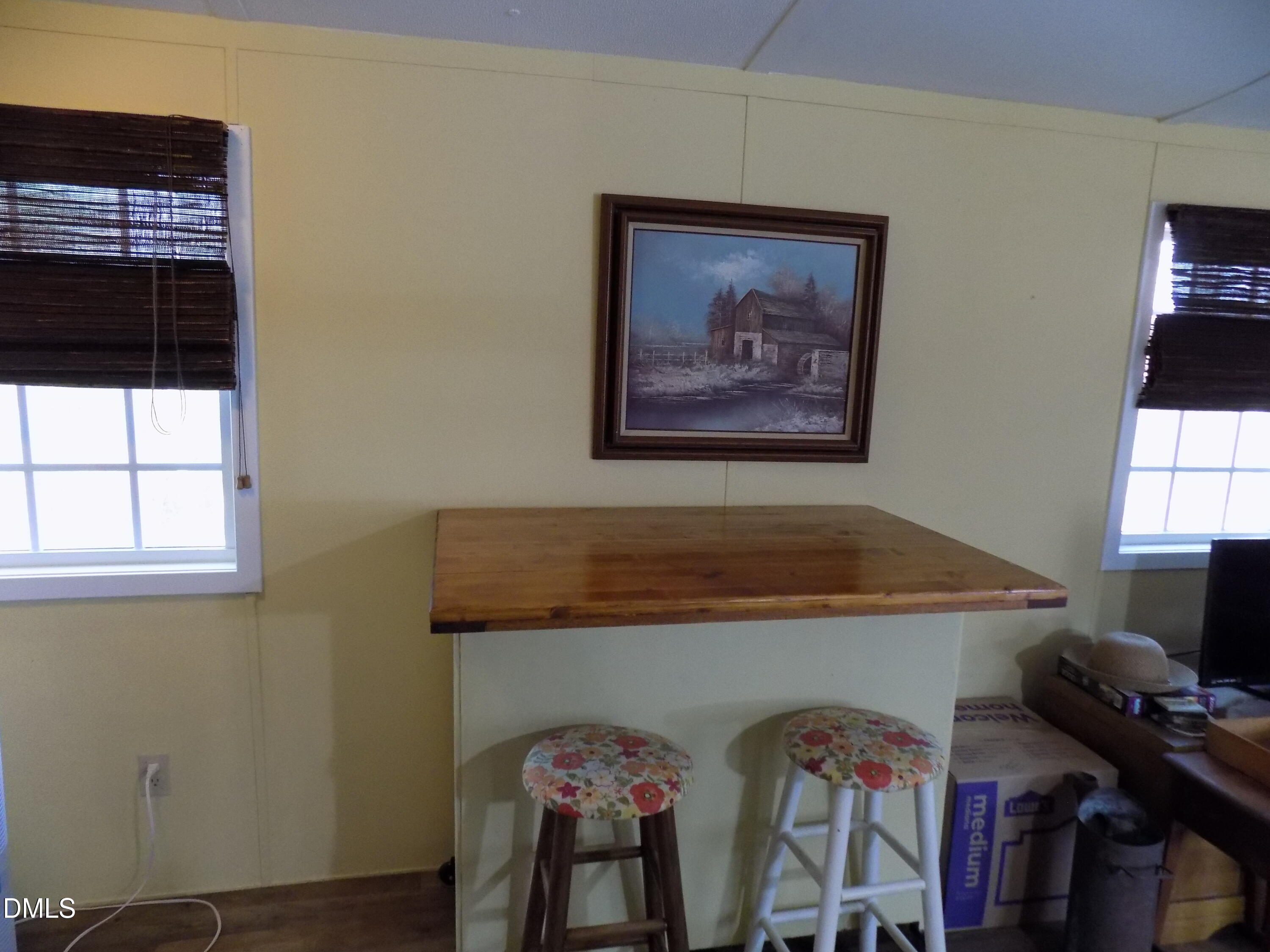 15 Full Circle Spring Hope, NC 27882 - Photo 34 of 51 a view of a room that has a couch and a stove in it