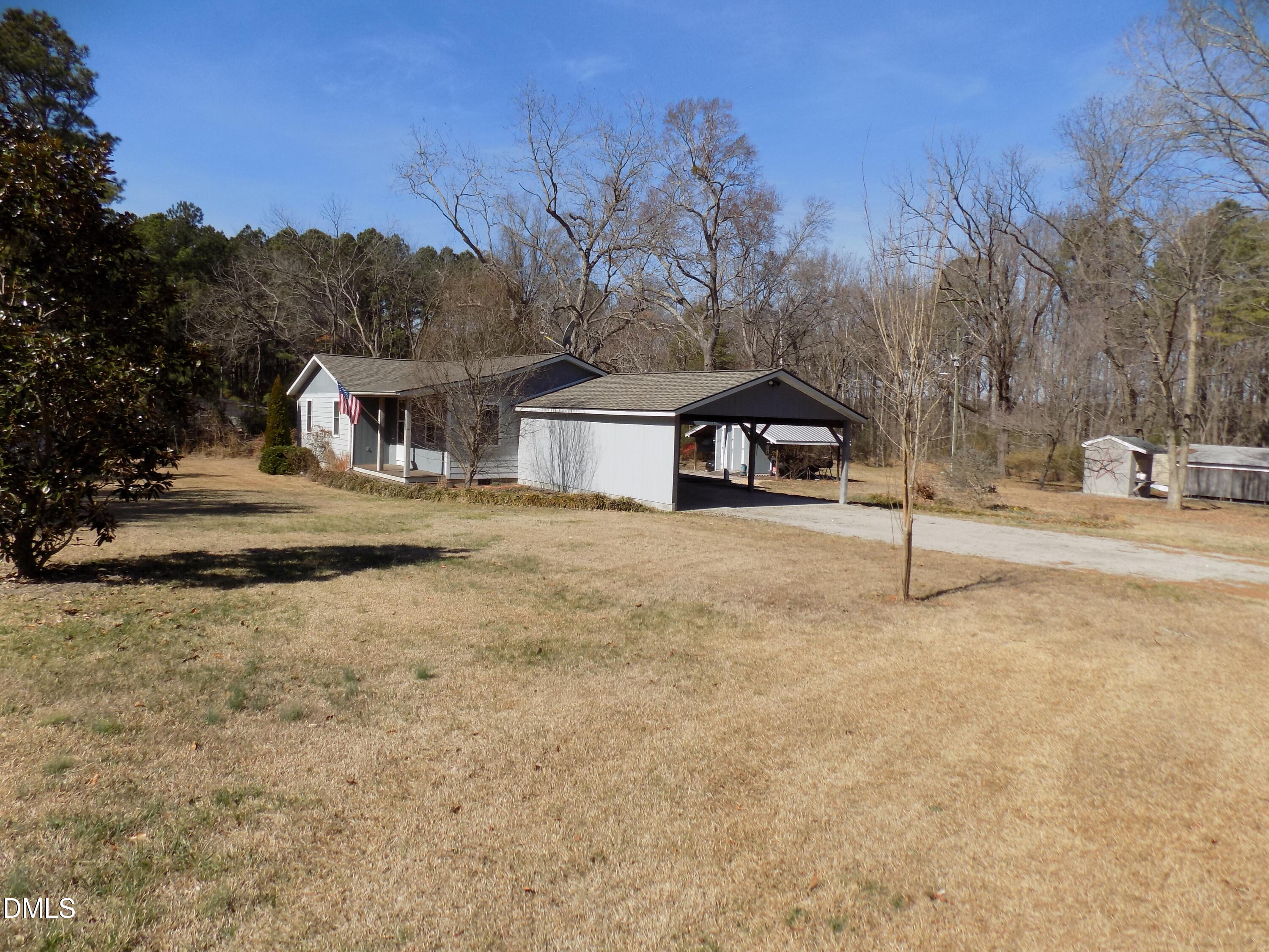 15 Full Circle Spring Hope, NC 27882 - Photo 4 of 51 a house with trees in the background