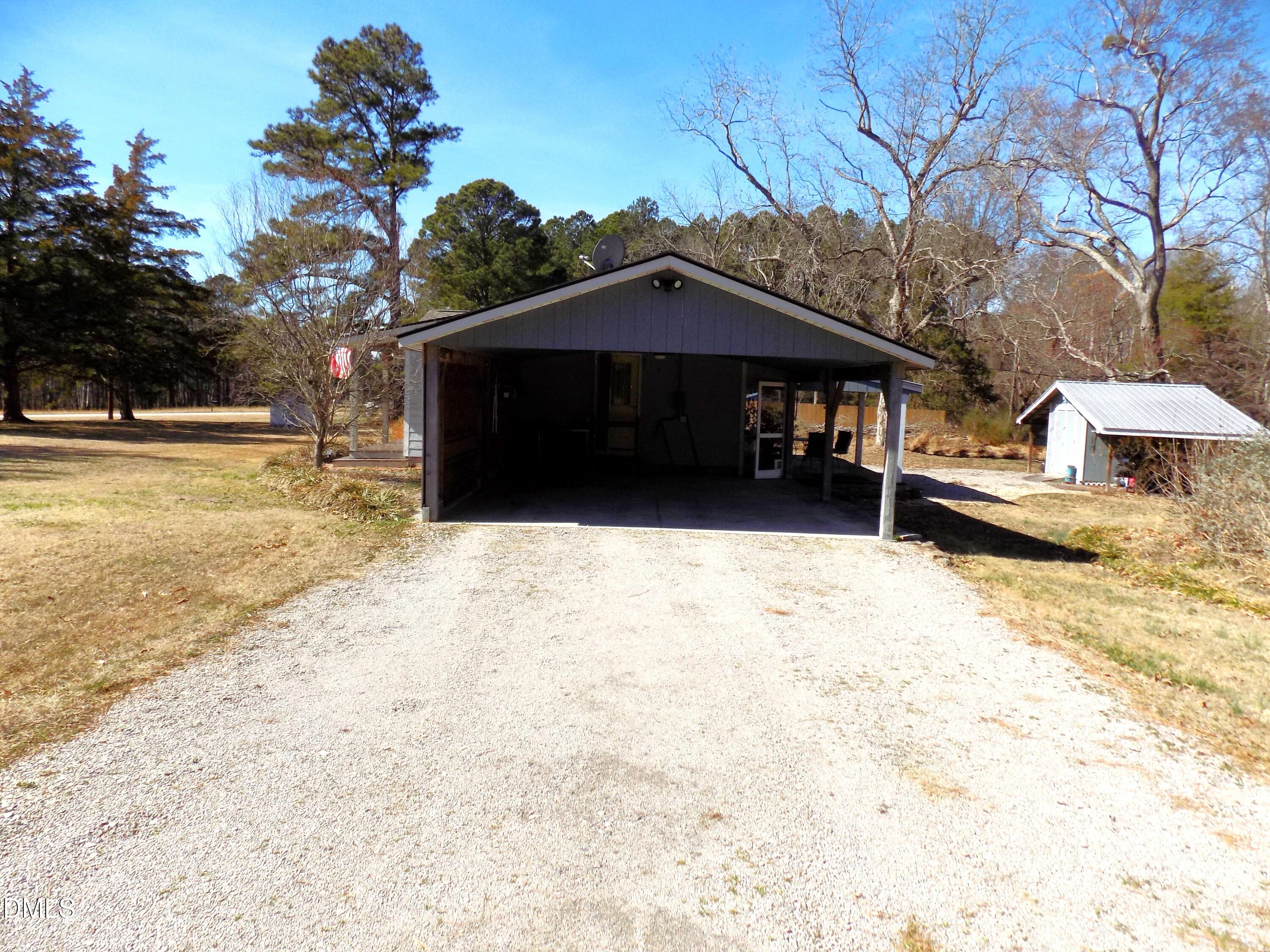 15 Full Circle Spring Hope, NC 27882 - Photo 5 of 51 a view of a house with a yard covered in snow
