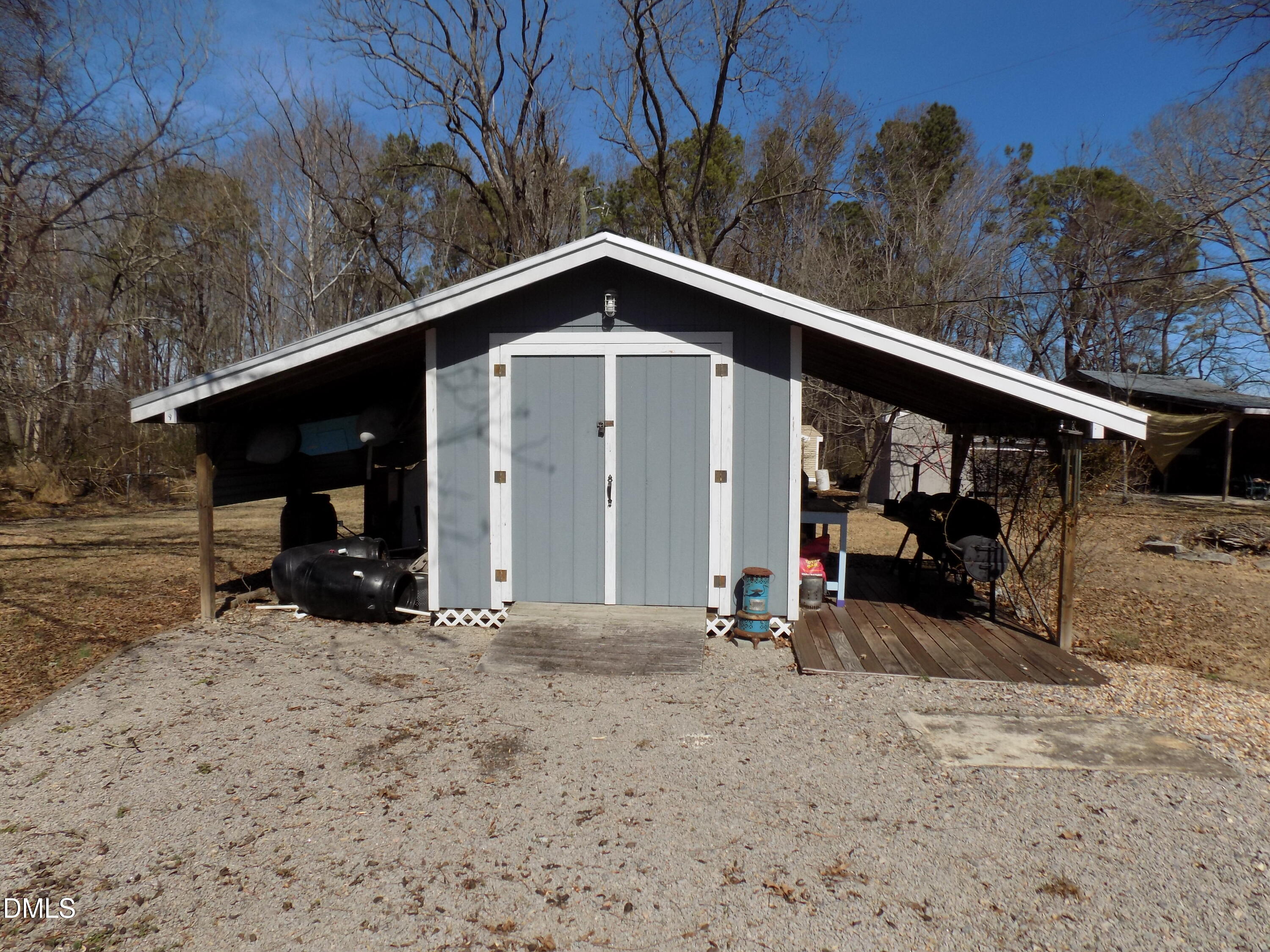 15 Full Circle Spring Hope, NC 27882 - Photo 9 of 51 a view of a house with a yard