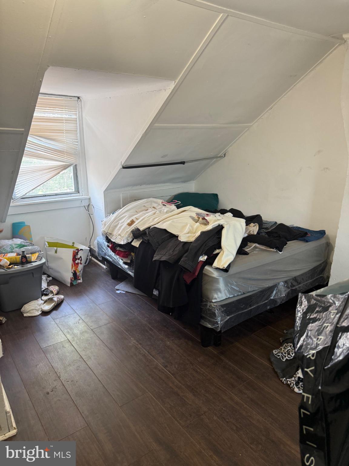 115 West Elm Street Reading, PA 19601 - Photo 7 of 13 Cluttered attic retreat with sloped ceiling.