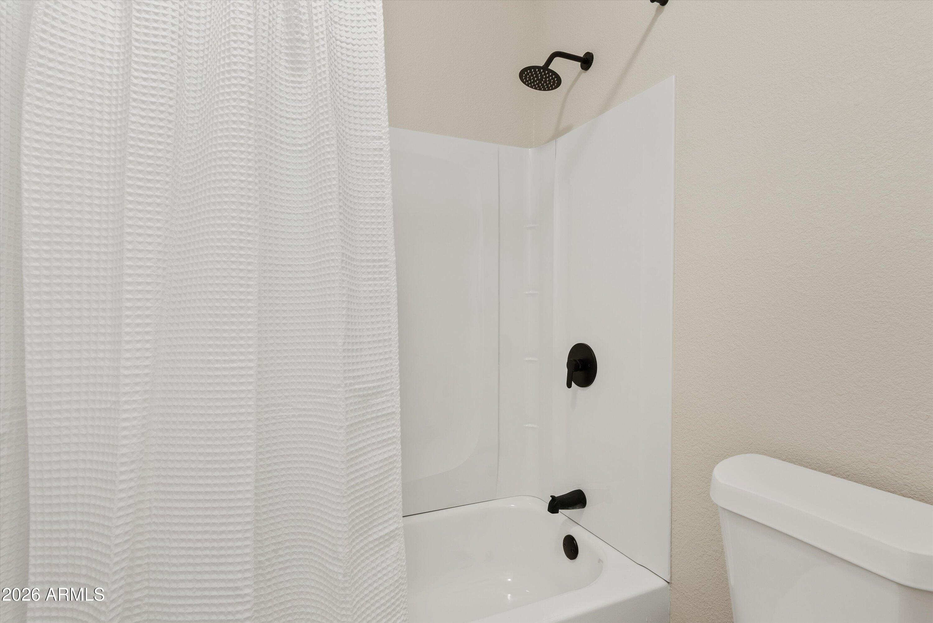 720 South Dobson Road, Unit 55 Mesa, AZ 85202 - Photo 14 of 33 a bathroom with a shower