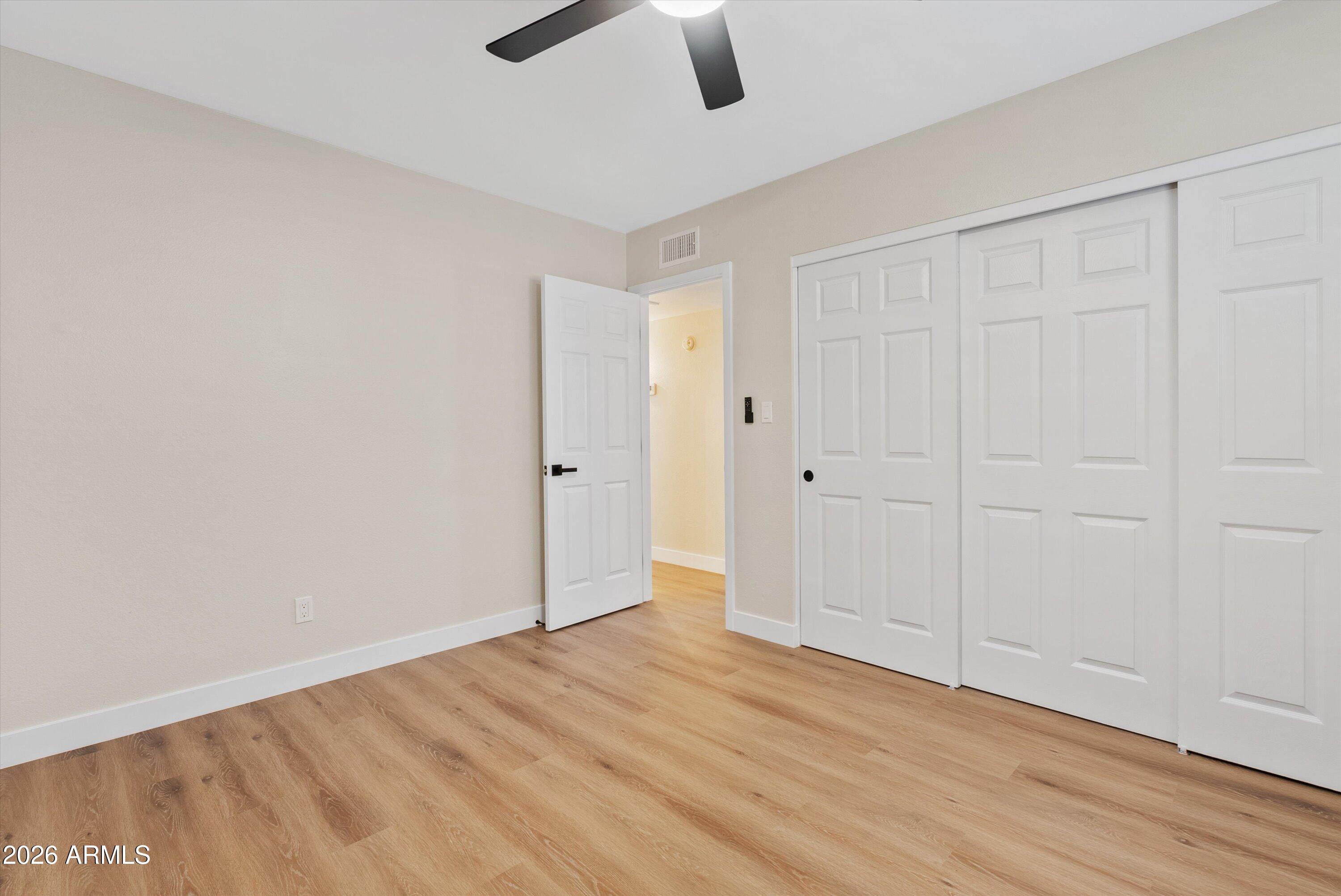 720 South Dobson Road, Unit 55 Mesa, AZ 85202 - Photo 18 of 33 wooden floor in an empty room