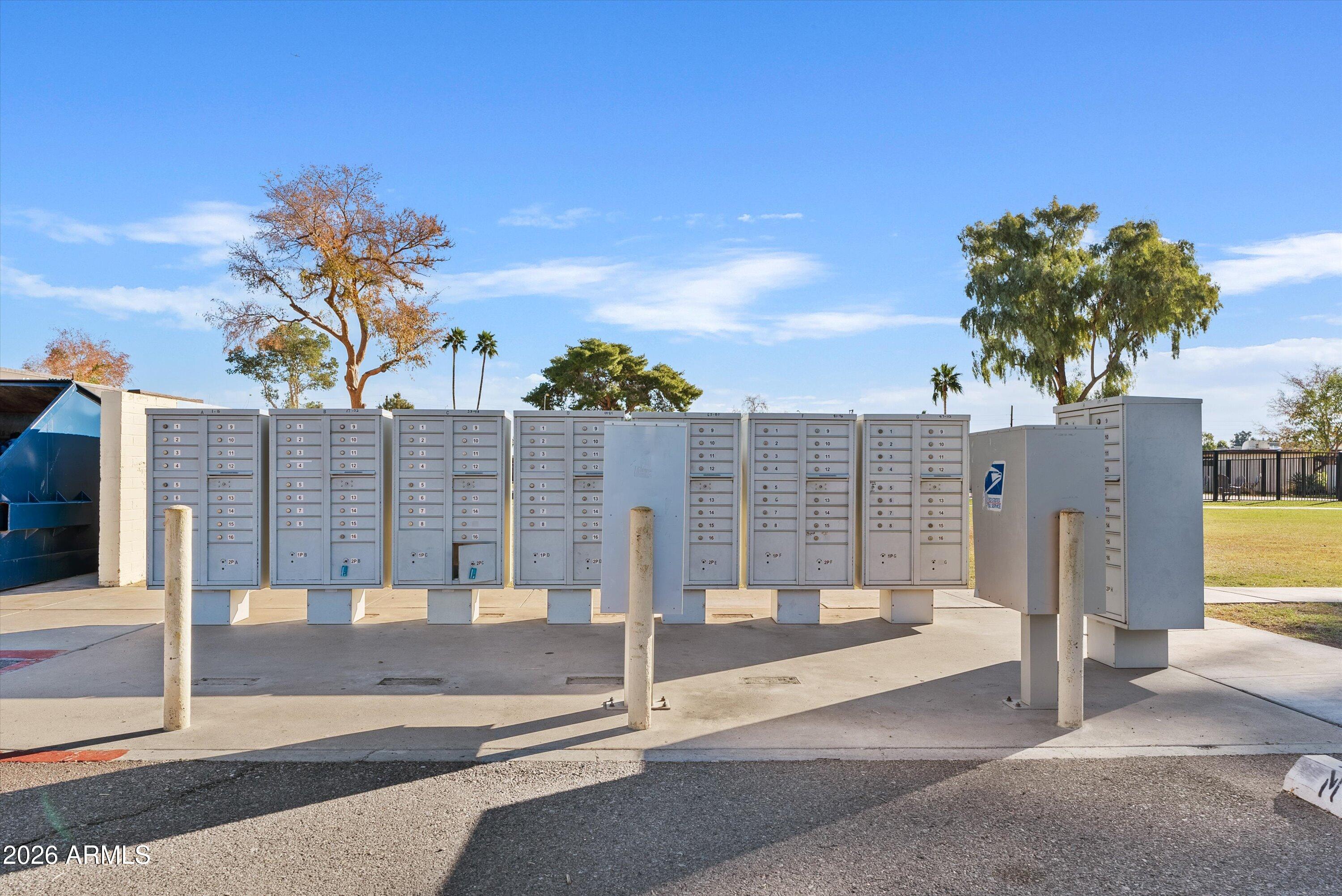 720 South Dobson Road, Unit 55 Mesa, AZ 85202 - Photo 28 of 33 a view of a parking area