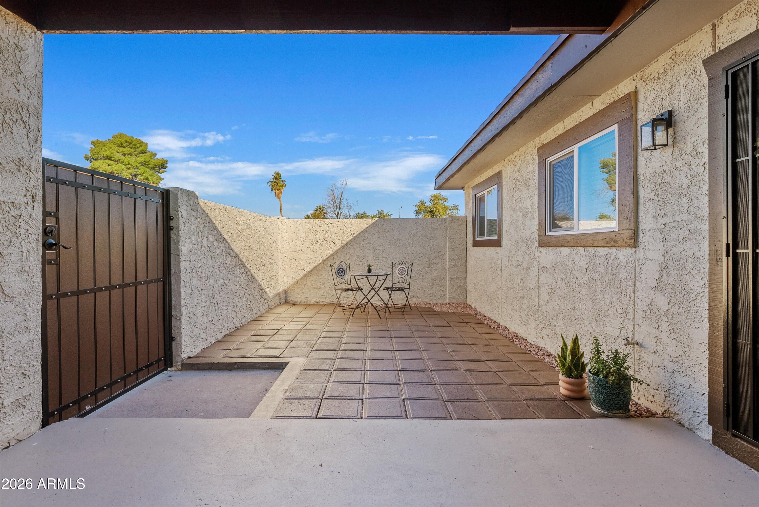 720 South Dobson Road, Unit 55 Mesa, AZ 85202 - Photo 2 of 33 a view of a terrace with sky view