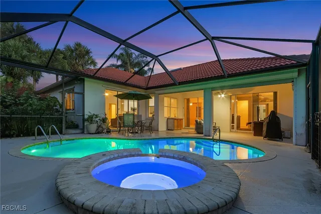 a view of swimming pool with seating space