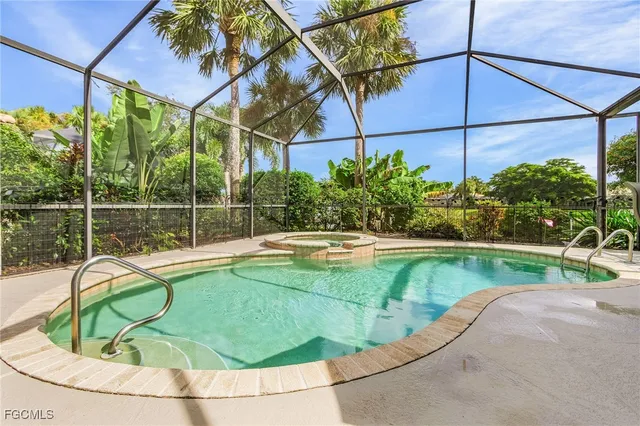 a view of a swimming pool with a patio