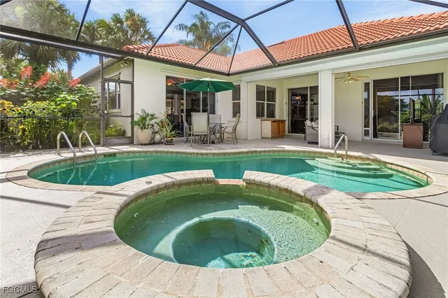 a view of a house with swimming pool
