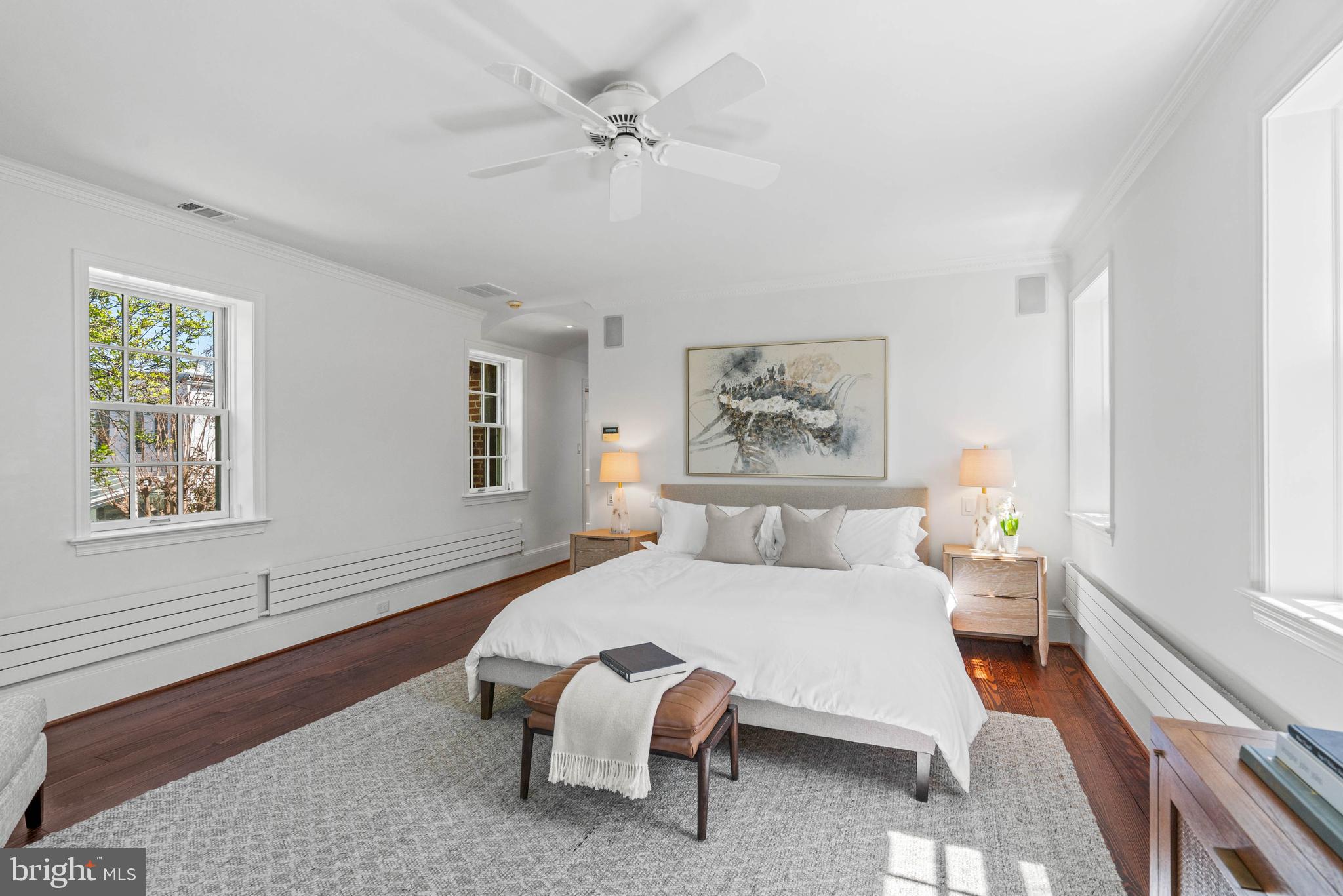 1406 34th Street Northwest Washington, DC 20007 - Photo 22 of 45 a bedroom with a bed and wooden floor