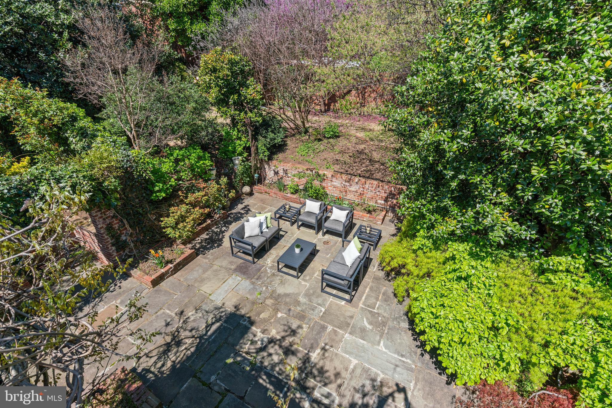 1406 34th Street Northwest Washington, DC 20007 - Photo 24 of 45 an aerial view of a house with a yard