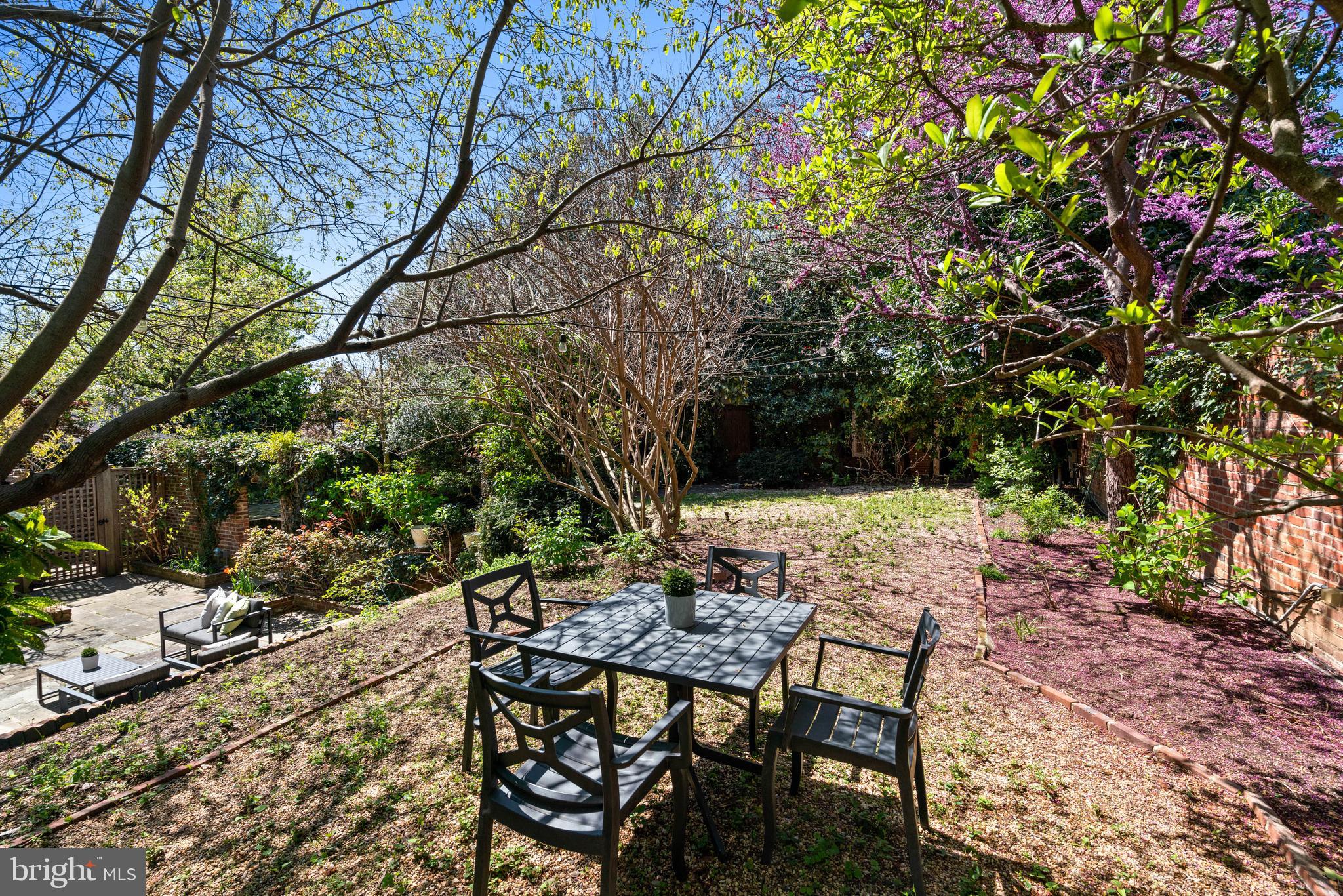 1406 34th Street Northwest Washington, DC 20007 - Photo 39 of 45 a view of an outdoor space with a table and chairs