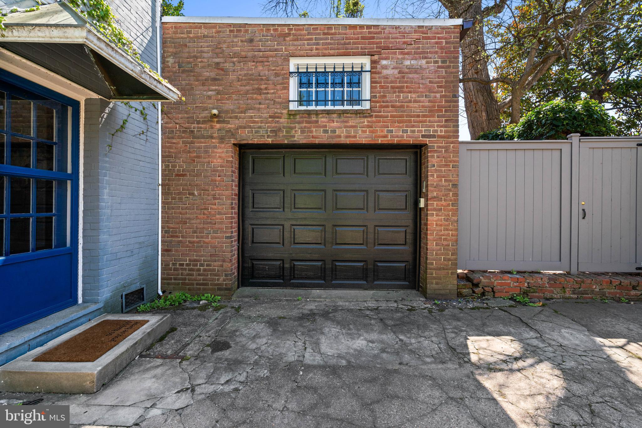 1406 34th Street Northwest Washington, DC 20007 - Photo 44 of 45 a front view of a house with garage