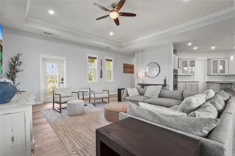 a kitchen with stainless steel appliances granite countertop a sink and cabinets