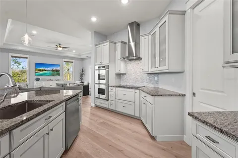 a bed room with a bed and a night stand