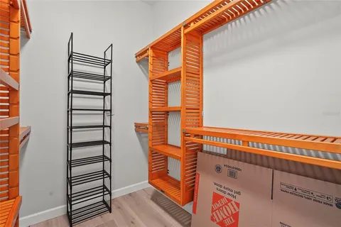 a view of a swimming pool with a lounge chair