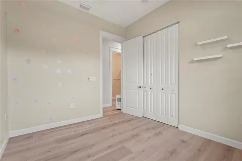 a lobby with furniture and floor to ceiling window