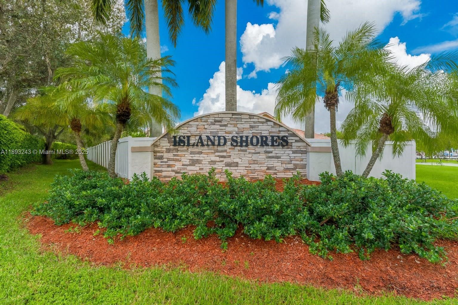 14032 Northwest 15th Street Pembroke Pines, FL 33028 - Photo 2 of 55 a view of a yard in front of a house with a yard