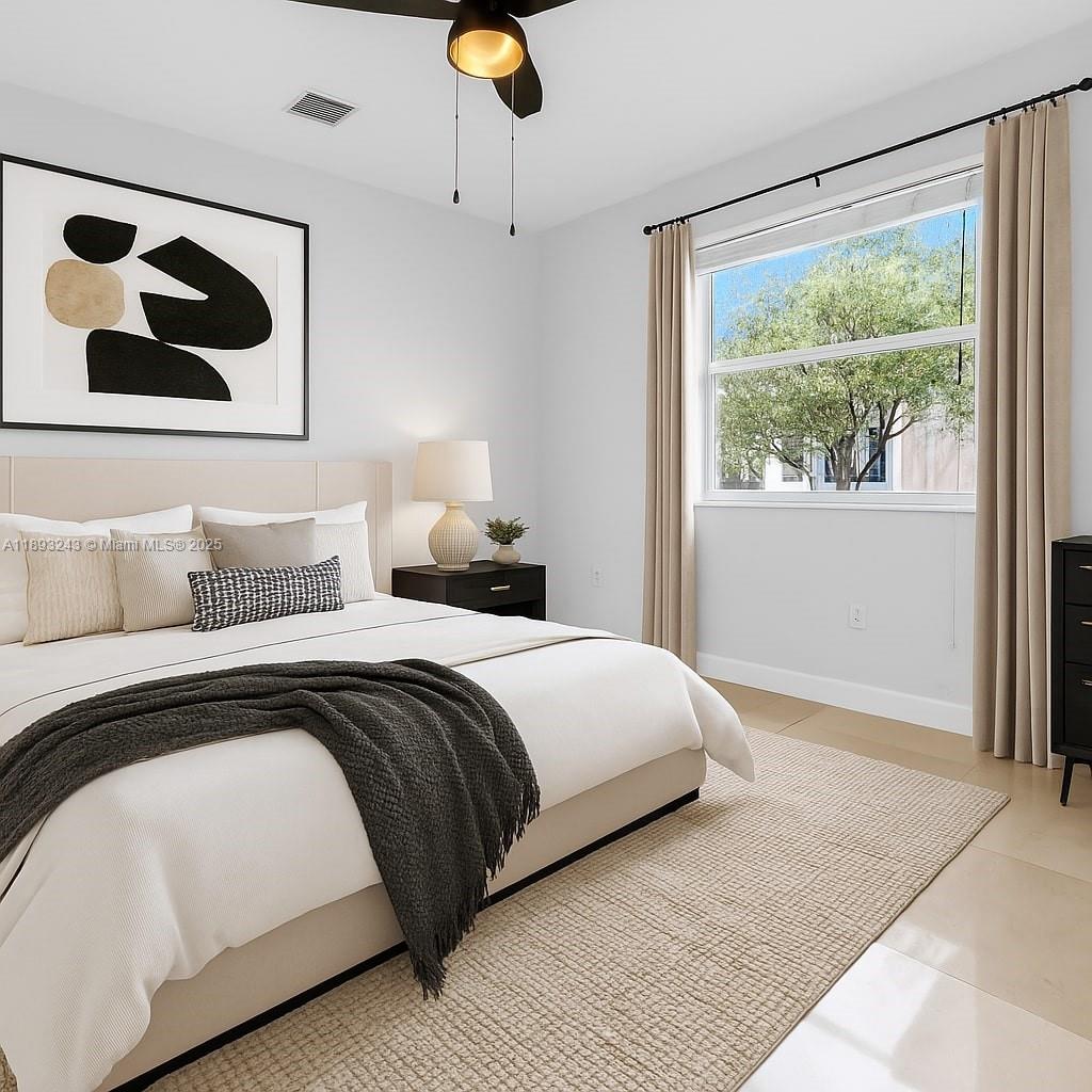 14032 Northwest 15th Street Pembroke Pines, FL 33028 - Photo 22 of 55 a bedroom with a bed and a painting on the wall