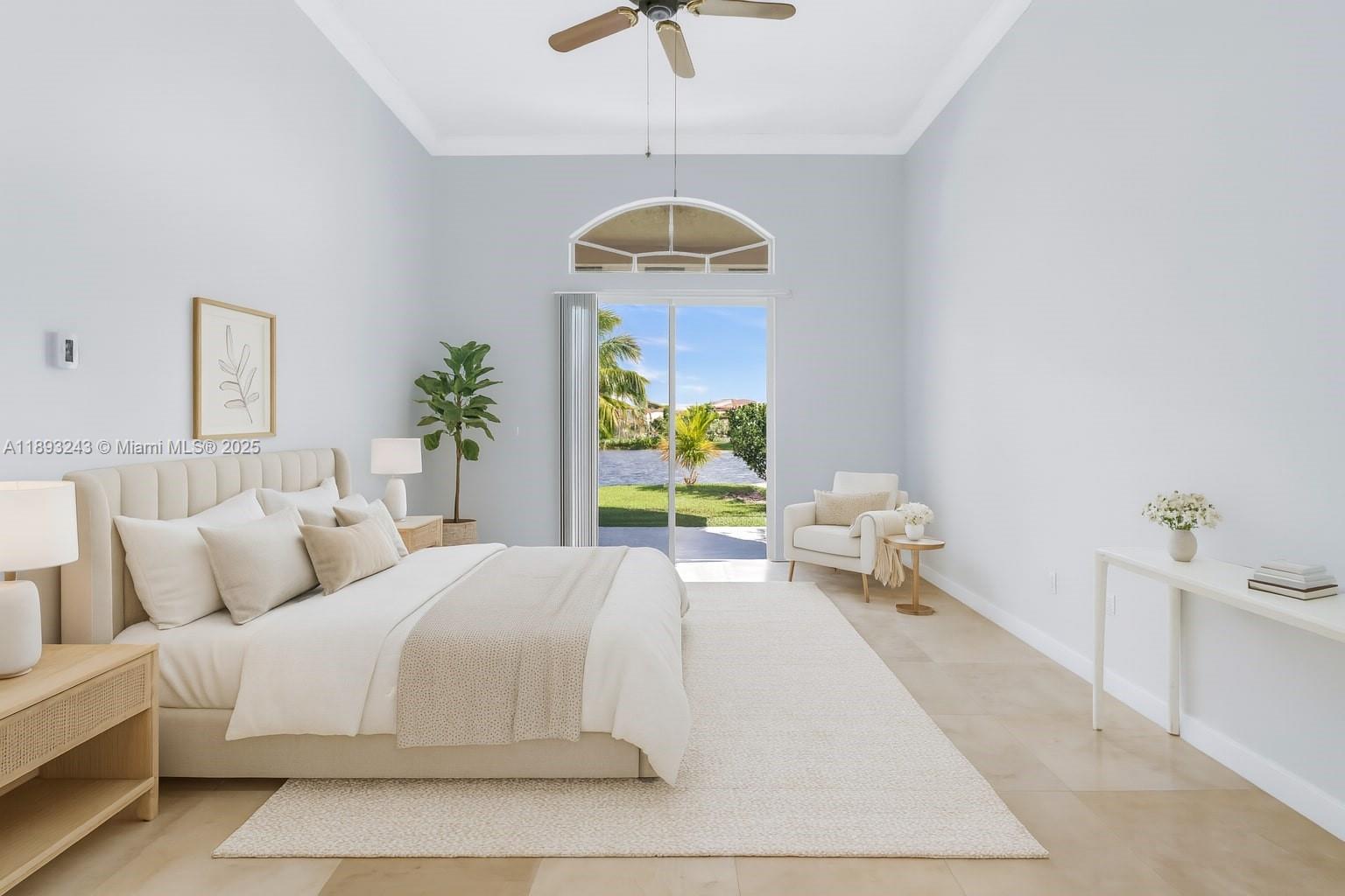 14032 Northwest 15th Street Pembroke Pines, FL 33028 - Photo 27 of 55 a bedroom with a bed and a chandelier