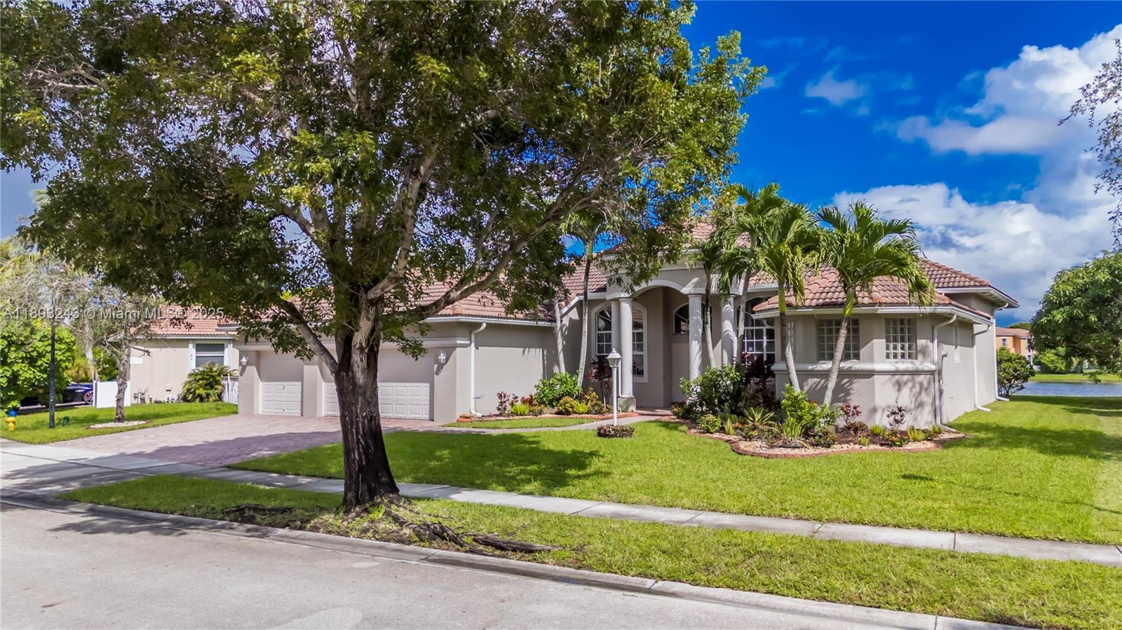 14032 Northwest 15th Street Pembroke Pines, FL 33028 - Photo 34 of 55 a front view of house with yard and green space