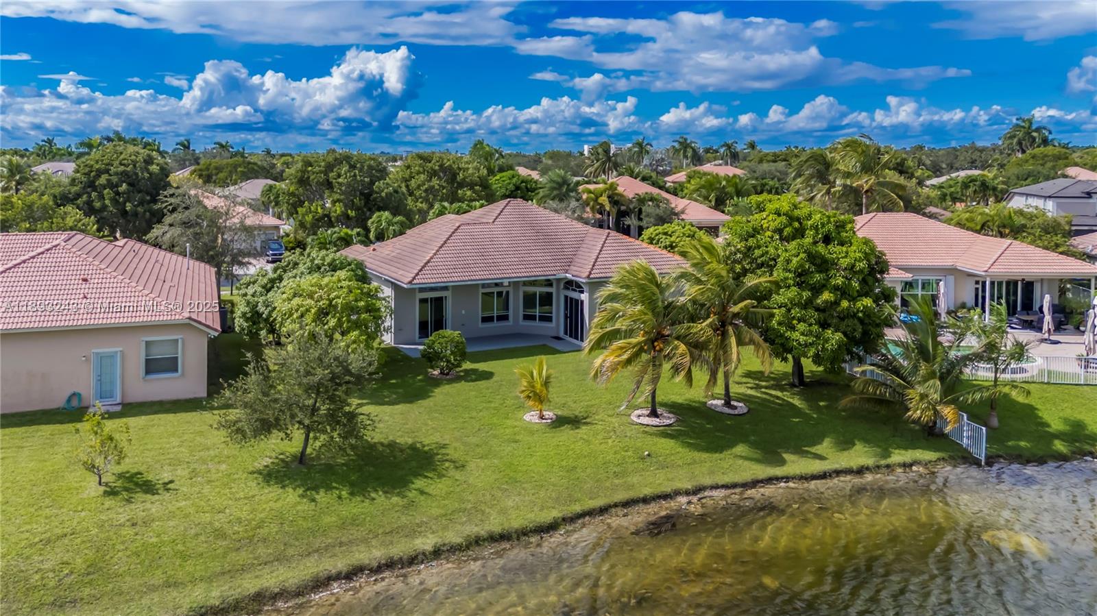 14032 Northwest 15th Street Pembroke Pines, FL 33028 - Photo 39 of 55 a view of a house with a yard