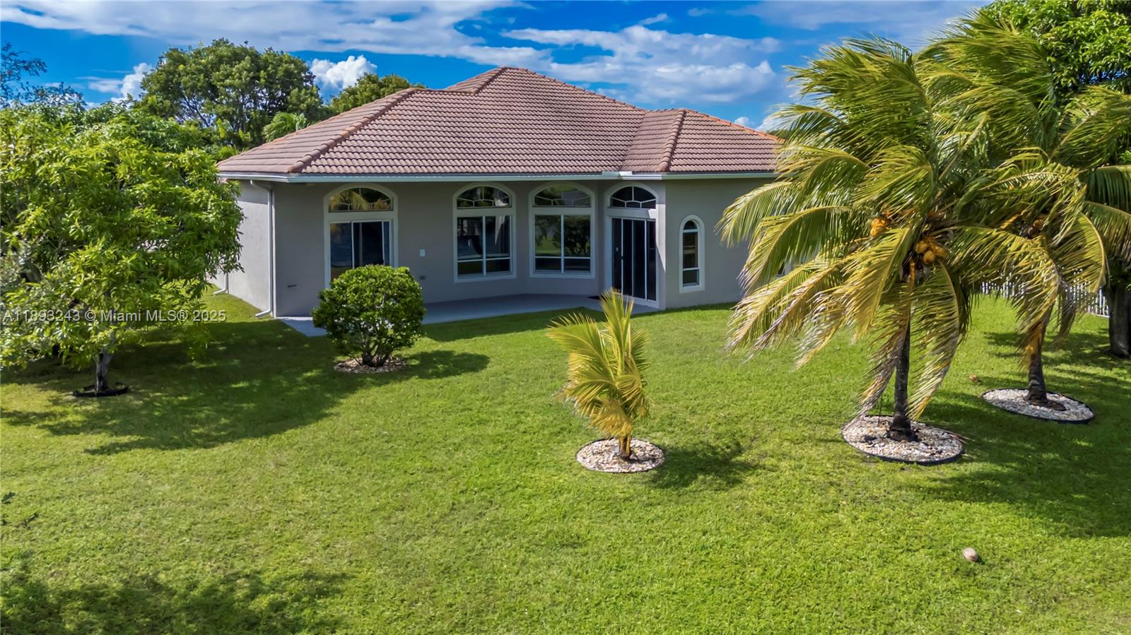 14032 Northwest 15th Street Pembroke Pines, FL 33028 - Photo 40 of 55 a view of a house with a yard