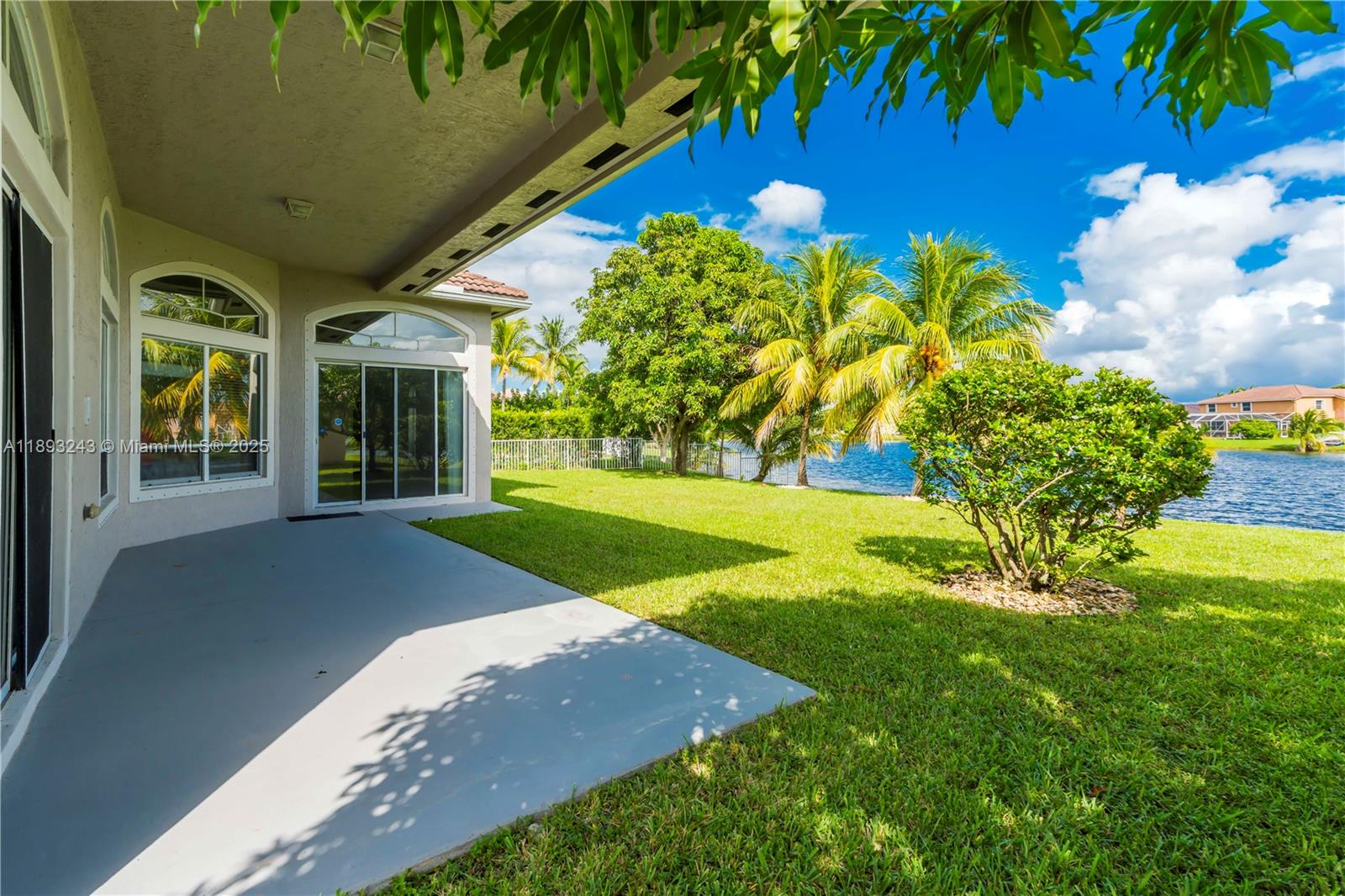 14032 Northwest 15th Street Pembroke Pines, FL 33028 - Photo 46 of 55 a view of a house with a yard