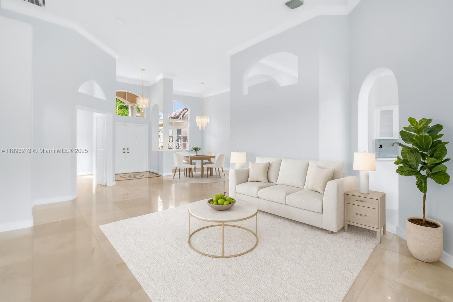 14032 Northwest 15th Street Pembroke Pines, FL 33028 - Photo 9 of 55 a living room with furniture potted plant and white walls