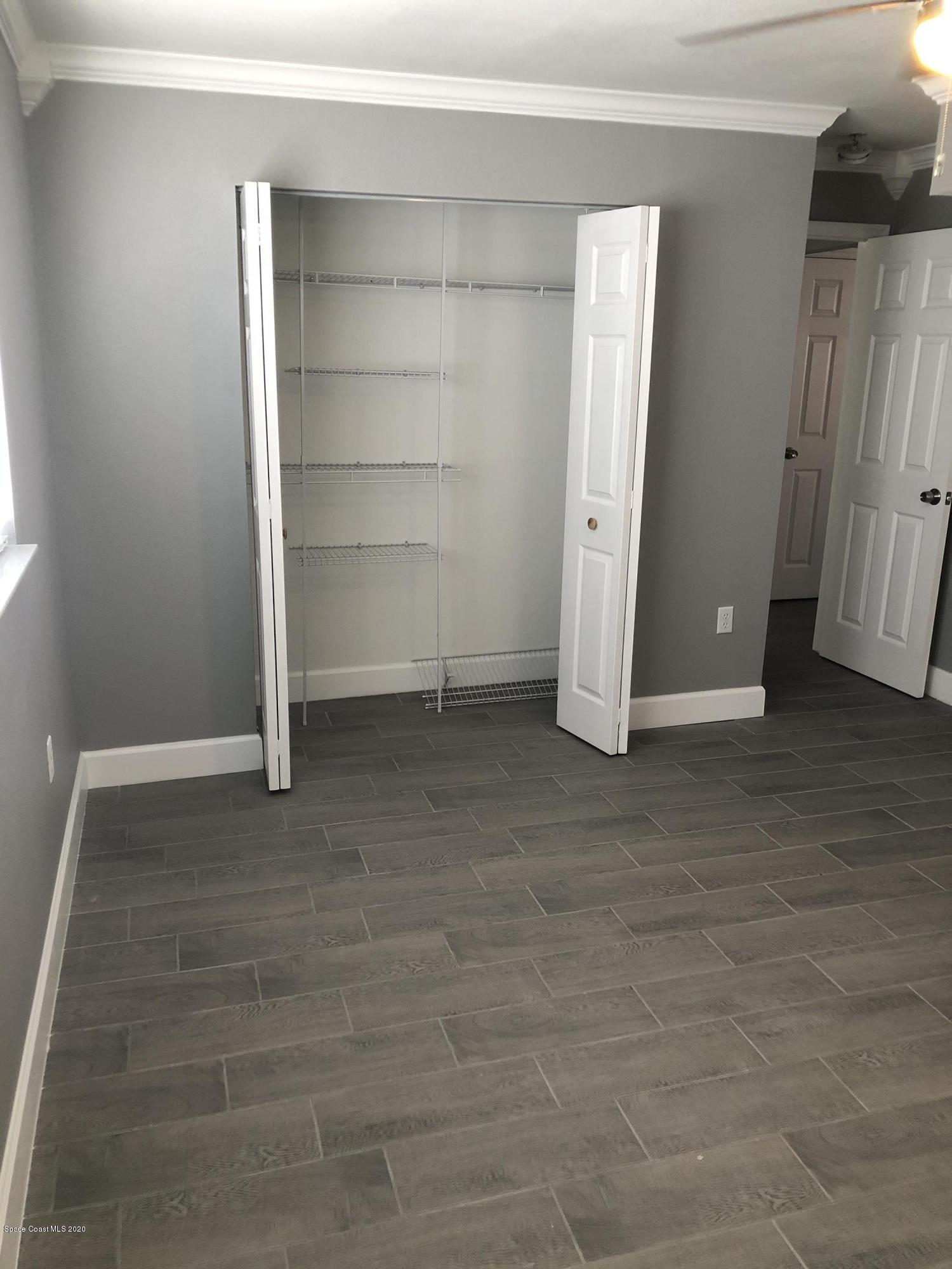 420 Monroe Avenue, Unit 101 Cape Canaveral, FL 32920 - Photo 13 of 35 a view of an empty room