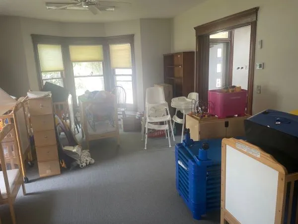 a room with furniture and a window