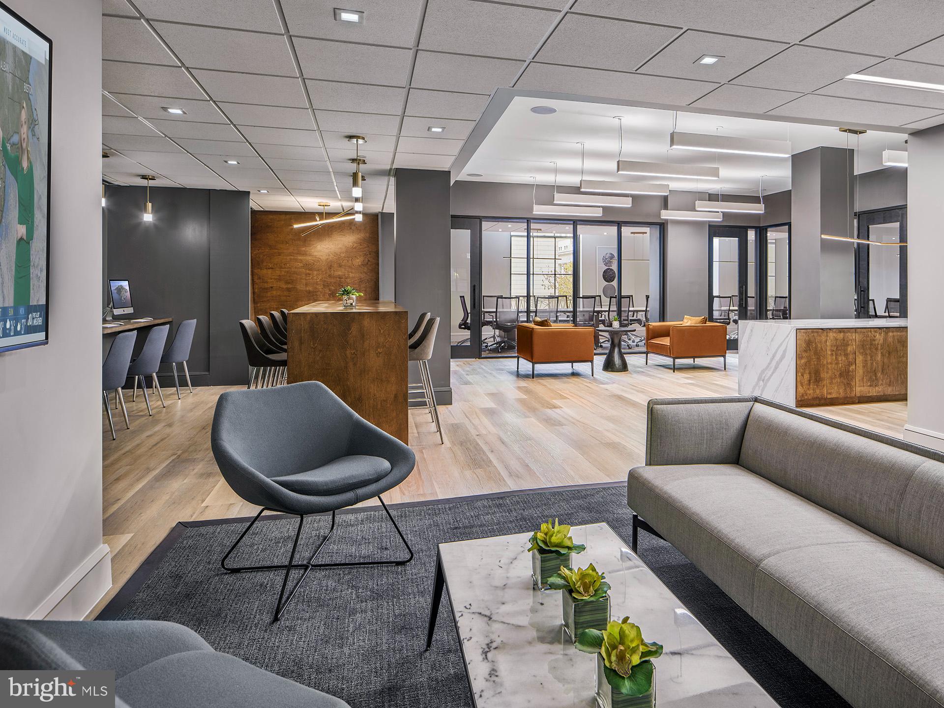875 Sansom Street, Unit 1731 Philadelphia, PA 19107 - Photo 25 of 35 a outdoor living space with furniture and a potted plant