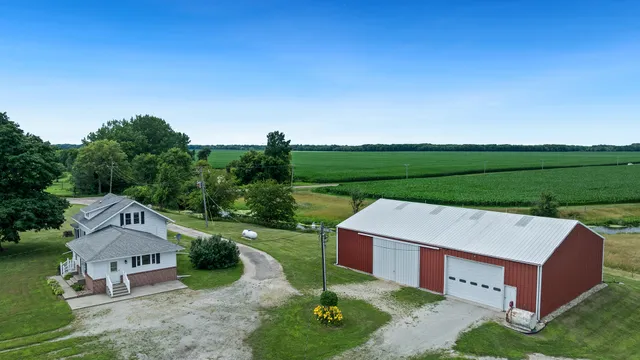 an aerial view of a house with a garden