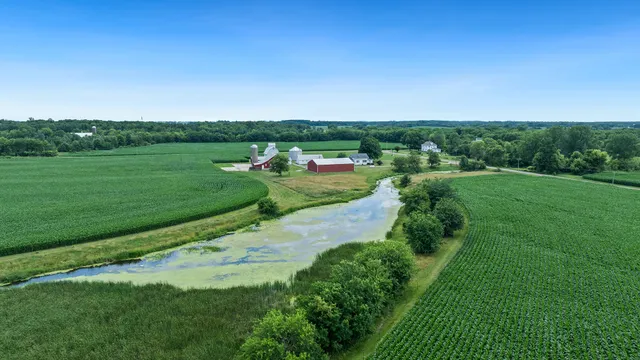 a view of a street with a yard