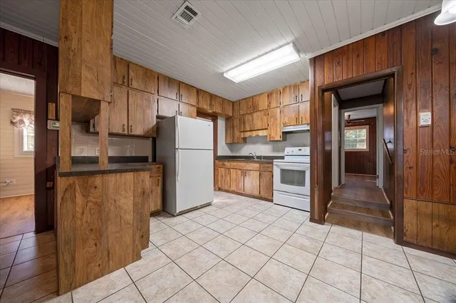 a bathroom with a sink a toilet and a bathtub