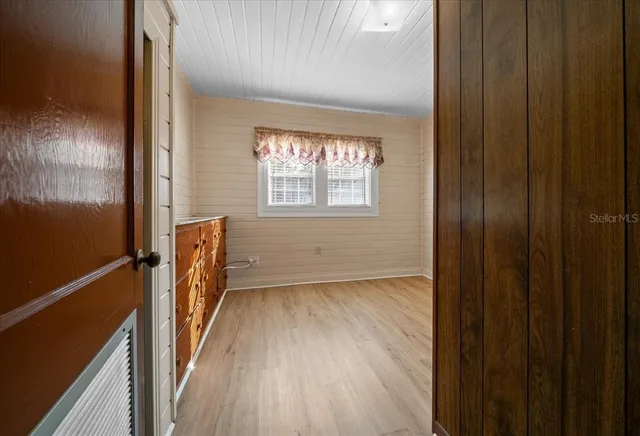 a view of a backyard of the house