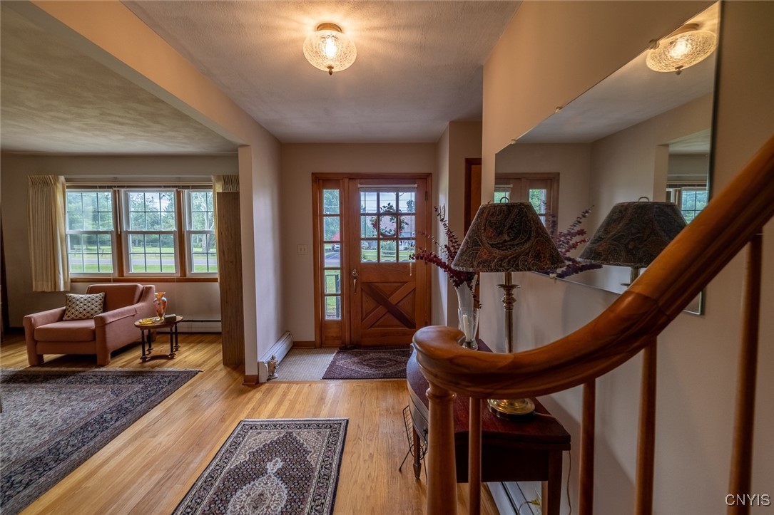 5157 Orangeport Road Clay, NY 13029 - Photo 3 of 43 Foyer/Living Room