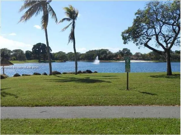 a view of a yard with palm tree