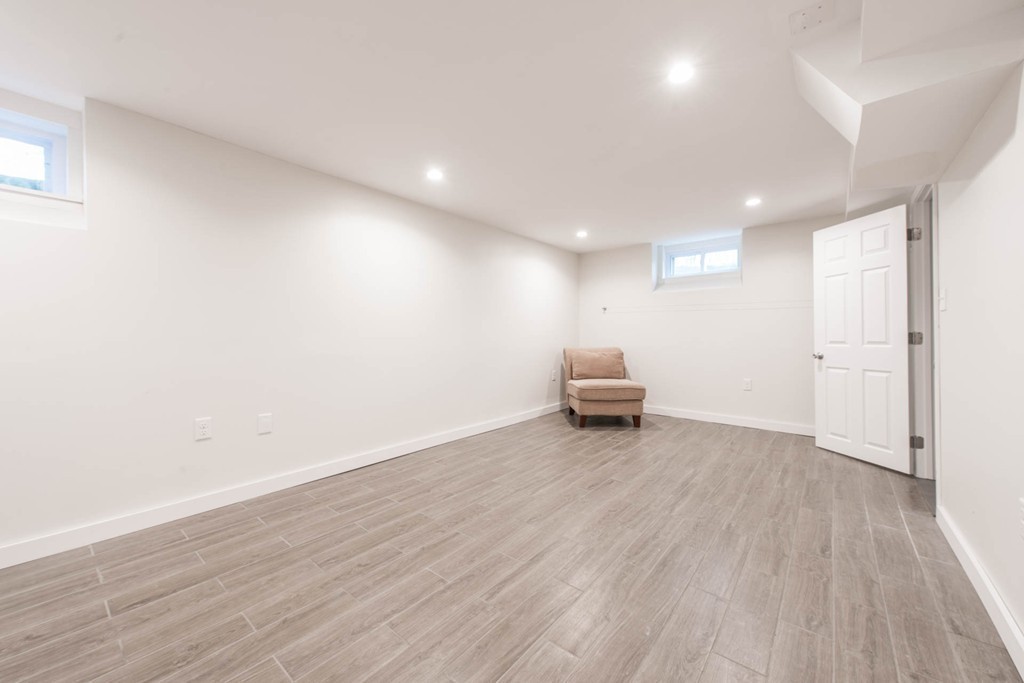 9 Legion Road Weston, MA 02493 - Photo 17 of 30 a view of empty room with wooden floor