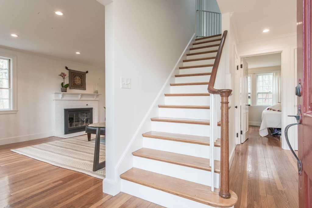 9 Legion Road Weston, MA 02493 - Photo 20 of 30 a view of entryway and hall with wooden floor