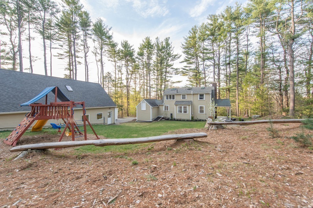 9 Legion Road Weston, MA 02493 - Photo 22 of 30 a view of a house with a yard