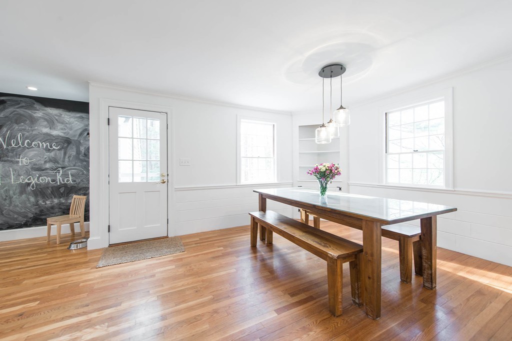 9 Legion Road Weston, MA 02493 - Photo 25 of 30 a living room with furniture a window and wooden floor