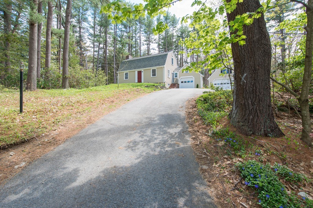 9 Legion Road Weston, MA 02493 - Photo 28 of 30 a front view of a house with a yard and an trees