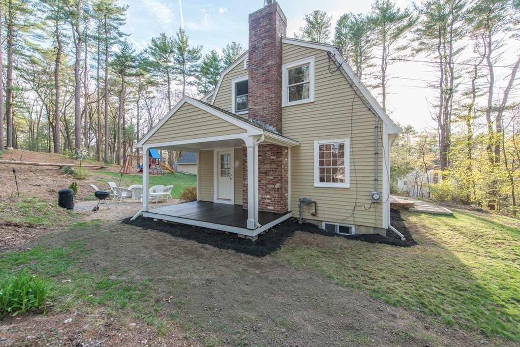 9 Legion Road Weston, MA 02493 - Photo 29 of 30 a view of a house with a yard and large trees