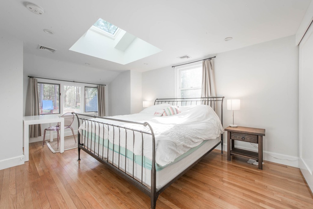 9 Legion Road Weston, MA 02493 - Photo 4 of 30 a bedroom with a bed and a window